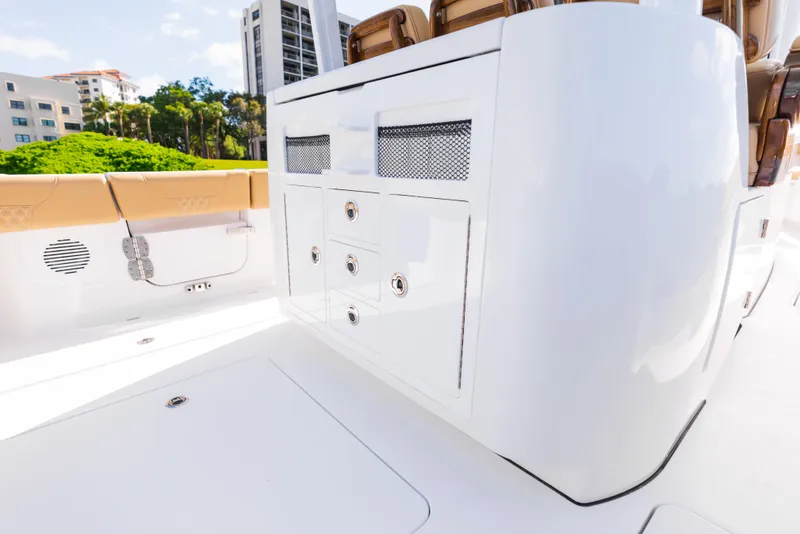 Slide: The Image of 2026 Phenom 34 Center Console boat interior with storage compartments and seating. - 16