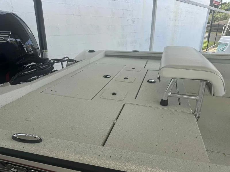 Slide: The Image of 2025 Ranger RB200 boat deck with seating and storage compartments. - 4