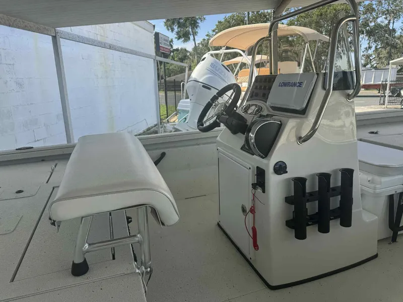 Slide: The Image of 2025 Ranger RB200 boat interior with steering console and seating. - 5