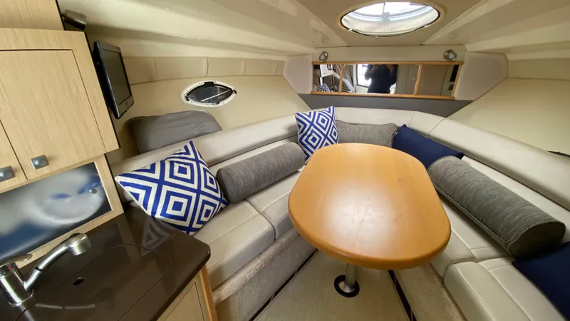 Slide: The Image of Luxurious interior of 2015 Monterey 295 Sport Yacht with cozy seating and stylish decor. - 31