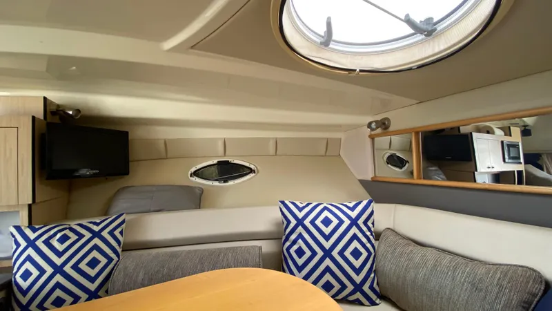 Slide: The Image of Interior of 2015 Monterey 295 Sport Yacht with cozy seating and stylish decor. - 32
