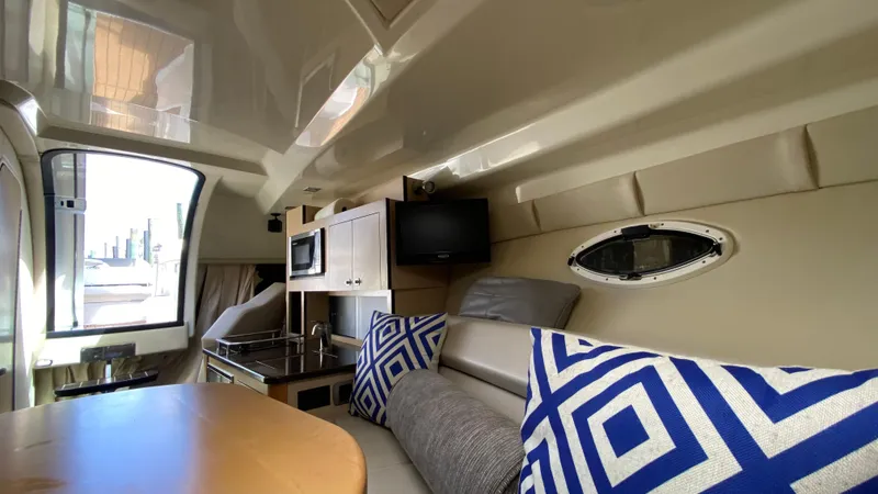 Slide: The Image of Interior of 2015 Monterey 295 Sport Yacht with modern amenities and stylish decor. - 35