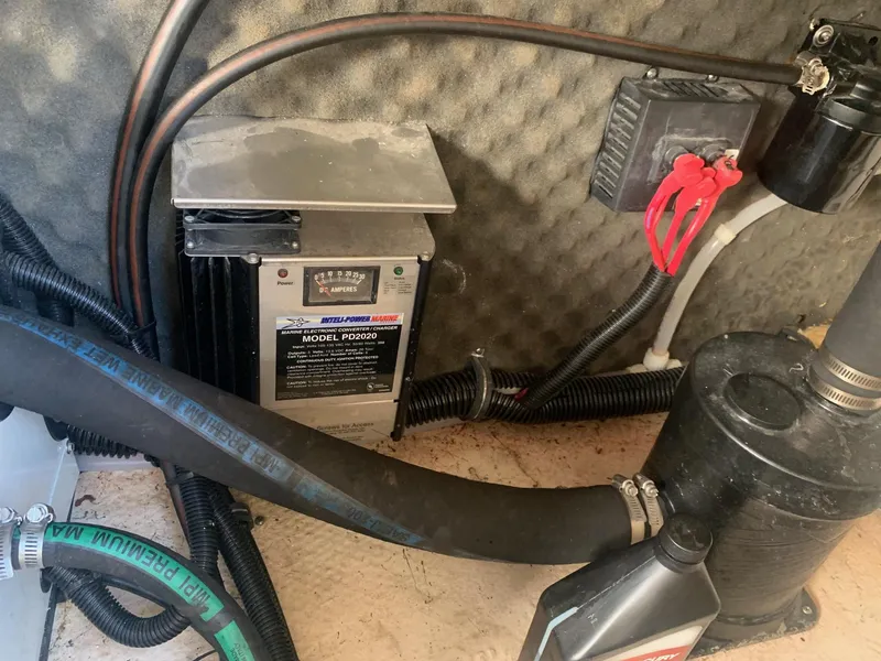 Slide: The Image of Engine compartment of 2003 Rinker FIESTA VEE 270 with marine electronics and wiring. - 20