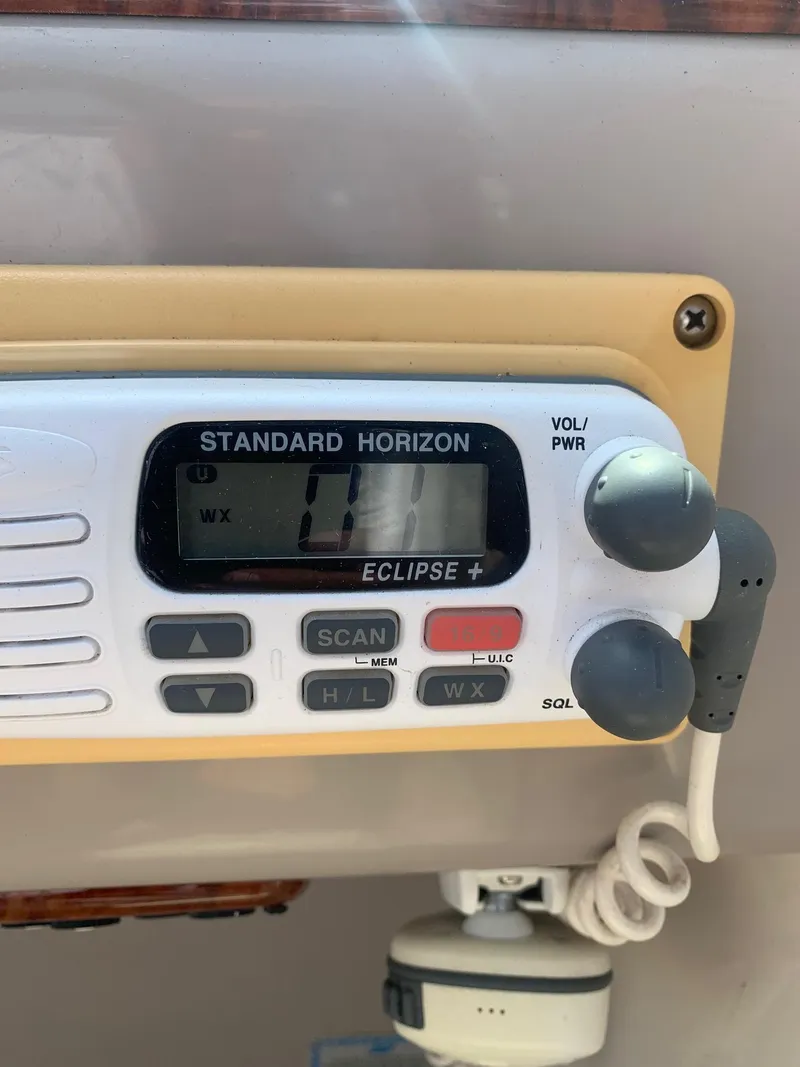 Slide: The Image of Standard Horizon Eclipse+ marine radio on 2003 Rinker FIESTA VEE 270 boat dashboard. - 23