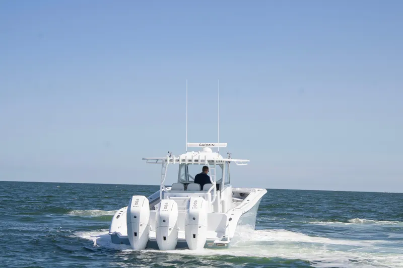 Slide: The Image of 2026 Yellowfin 42 Offshore boat cruising on open water. - 3