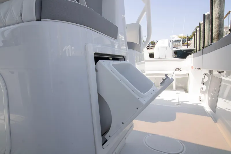 Slide: The Image of 2026 Yellowfin 42 Offshore boat interior with open storage compartment. - 34