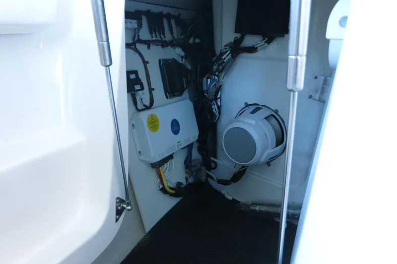 Slide: The Image of Interior wiring and components of a 2025 Chaparral 250 OSX boat. - 10