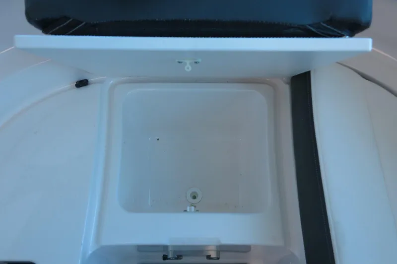 Slide: The Image of Storage compartment on 2025 Chaparral 250 OSX boat, featuring a sleek design. - 12
