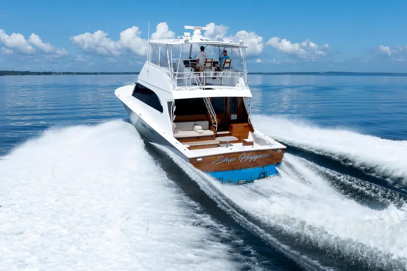 Slide: The Image of Luxury yacht "Ship Happens" cruising on calm waters, Post convertible 56, 2002 model. - 20