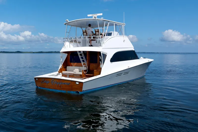 Slide: The Image of Luxury yacht "Ship Happens" on calm waters, Post convertible 56, 2002 model. - 21