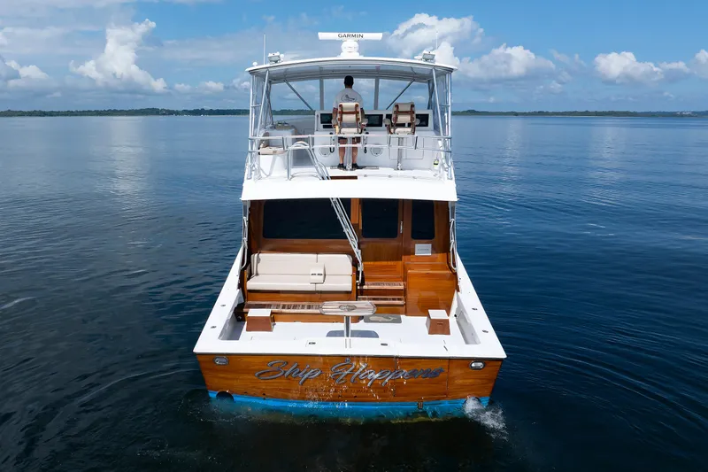 Slide: The Image of Luxury yacht "Ship Happens" on calm waters, Post Convertible 56, 2002 model. - 24