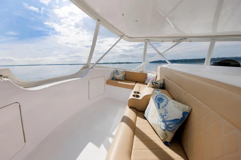 Slide: The Image of Luxurious interior of 2002 Post Convertible 56 yacht with plush seating and ocean view. - 42