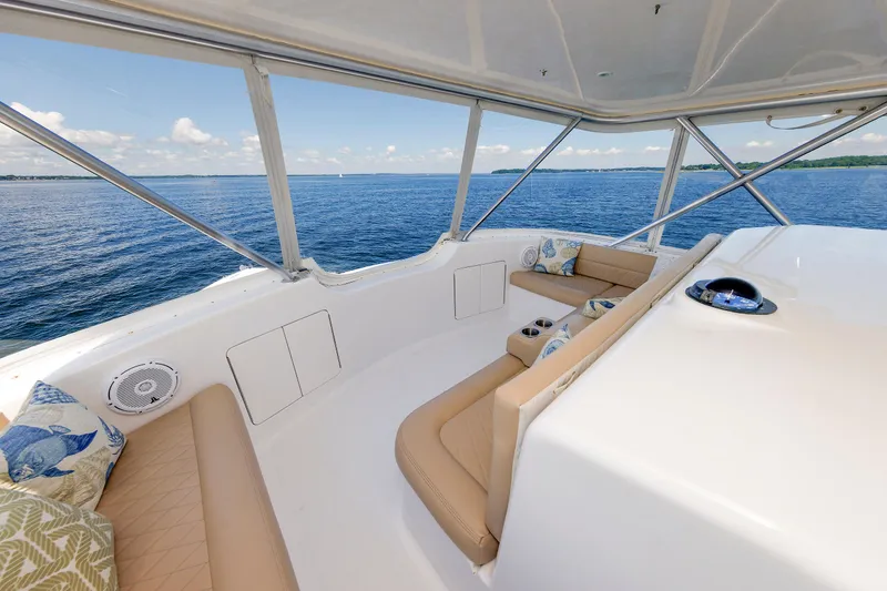 Slide: The Image of Luxurious 2002 Post Convertible 56 yacht interior with ocean view and comfortable seating. - 44