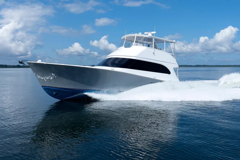 Slide: The Image of Luxury yacht cruising on calm waters under a clear blue sky. - 6