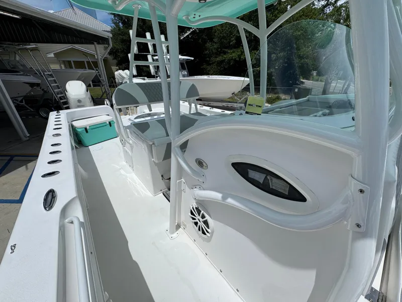 Slide: The Image of 2020 Twin Vee 310 CC GF boat interior with seating and console. - 29