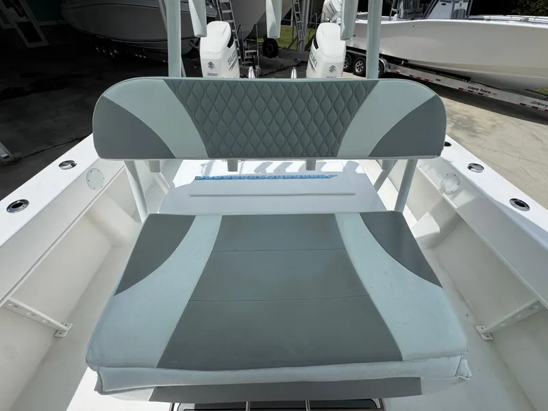 Slide: The Image of 2020 Twin Vee 310 CC GF boat seating area with stylish upholstery design. - 31