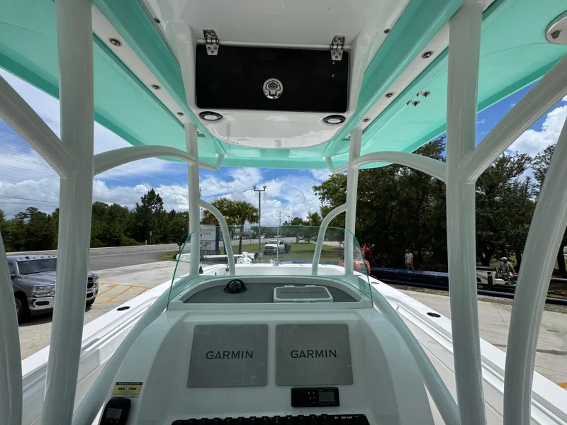 Slide: The Image of 2020 Twin Vee 310 CC GF boat interior with Garmin navigation system. - 35