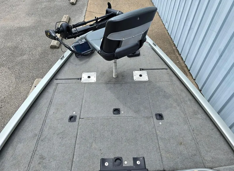 Slide: The Image of 2007 Fisher Pro Hawk 170 boat deck with seat and trolling motor. - 5