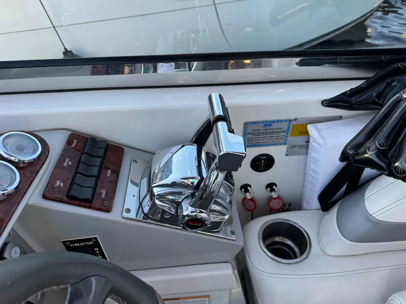 Slide: The Image of Control panel of a 2006 Formula 370 SS boat with chrome throttle and gauges. - 9