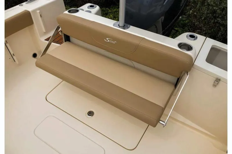Slide: The Image of Manufacturer Provided Image: 2021 Scout 215 Dorado boat with tan fold-down bench seat and cup holders. - 10