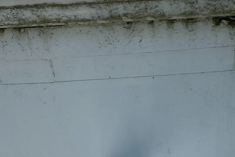 Slide: The Image of 2002 Pro-Line 22 Sport Center Console hull identification number on weathered surface. - 10