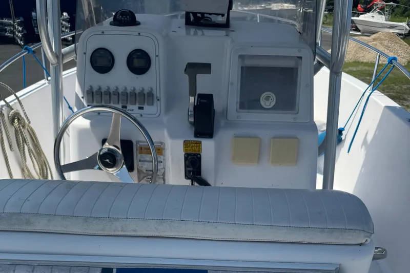 Slide: The Image of 2002 Pro-Line 22 Sport Center Console, steering wheel and control panel view. - 4