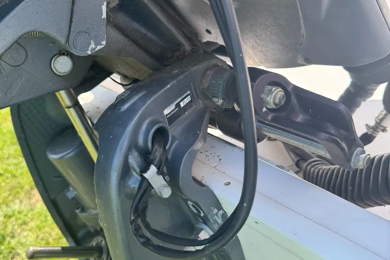 Slide: The Image of Close-up of a 2002 Pro-Line 22 Sport Center Console boat engine component. - 9