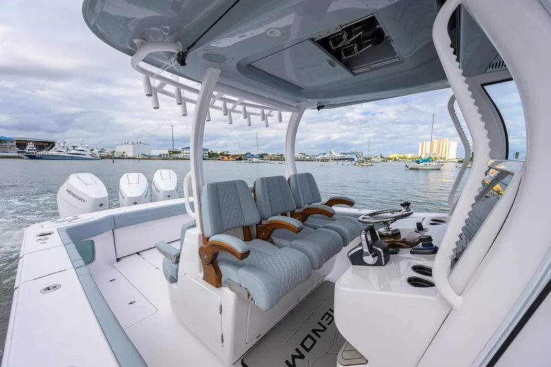 Slide: The Image of 2026 Phenom 37 Center Console boat interior with luxurious seating and advanced controls. - 17