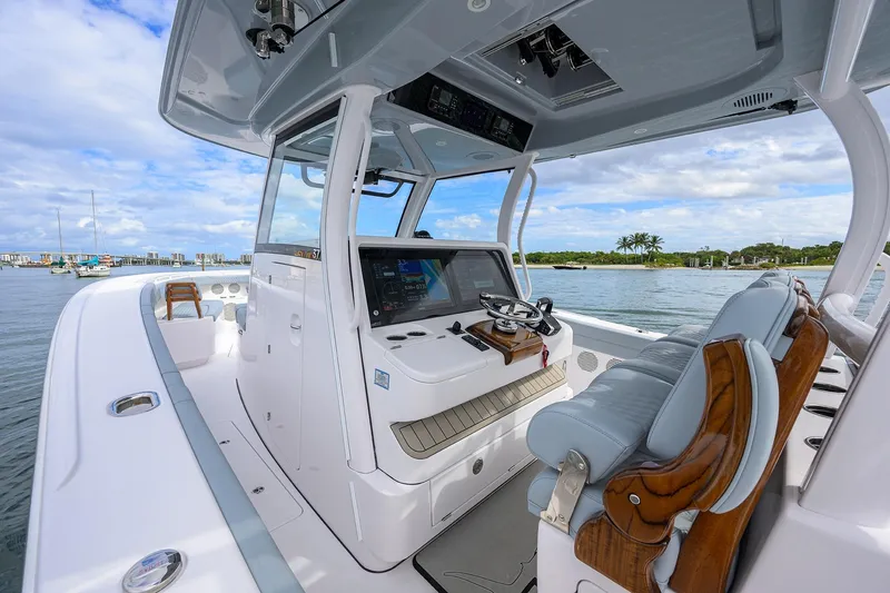 Slide: The Image of 2026 Phenom 37 Center Console boat interior with modern helm and seating. - 18