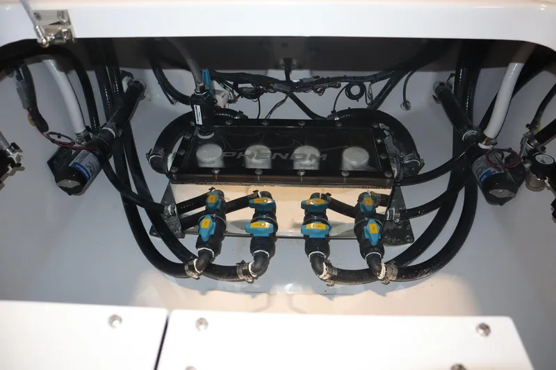 Slide: The Image of 2026 Phenom 37 Center Console boat interior with luxurious seating and marina view. - 8