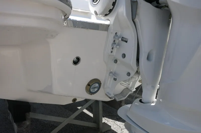 Slide: The Image of Close-up of 2025 Chaparral 270 OSX boat engine mount and transom details. - 10