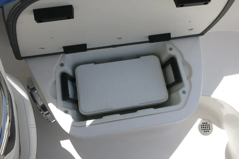 Slide: The Image of Built-in cooler compartment on 2025 Chaparral 270 OSX boat. - 31