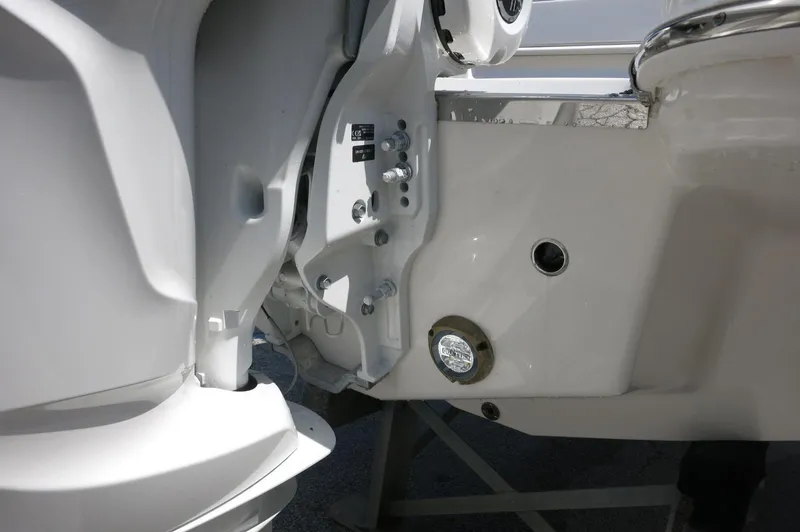 Slide: The Image of Close-up of 2025 Chaparral 270 OSX boat engine compartment details. - 9
