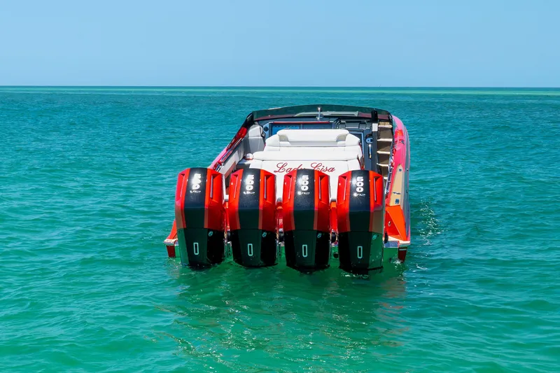 Slide: The Image of 2023 Nor-Tech 55 Flyer boat with four powerful engines on turquoise water. - 18