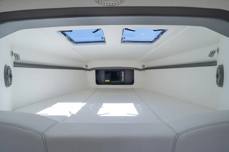 Slide: The Image of Interior cabin of 2023 Nor-Tech 55 Flyer, featuring skylights and modern design. - 49