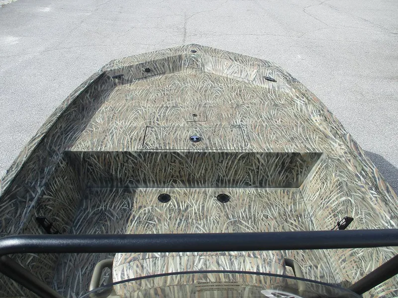 Slide: The Image of 2026 Tracker Grizzly 1860 CC boat with camouflage design on deck. - 12