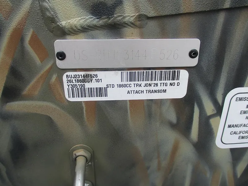 Slide: The Image of 2026 Tracker Grizzly 1860 CC boat identification plate with serial and model details. - 18