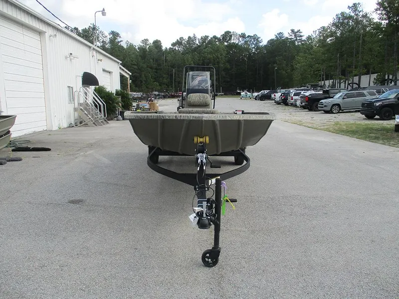 Slide: The Image of 2026 Tracker Grizzly 1860 CC boat on trailer in parking lot. - 3
