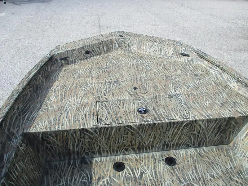 Slide: The Image of 2026 Tracker Grizzly 1860 CC boat with camouflage pattern deck. - 9