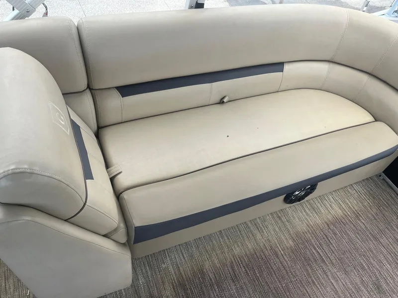 Slide: The Image of 2022 Godfrey Sweetwater 2286 FS boat seating, beige upholstery, spacious and comfortable design. - 5