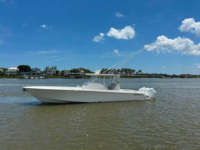 Slide: The Image of 2021 Contender 39 Fisharound boat cruising on a sunny day. - 2