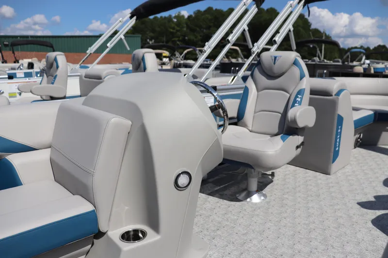 Slide: The Image of 2025 Trifecta LE Series 24RF LE pontoon boat interior with plush seating and modern design. - 4