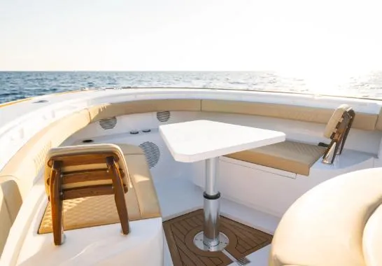 Slide: The Image of 2026 Phenom 43 Center Console boat with elegant seating and ocean view. - 2