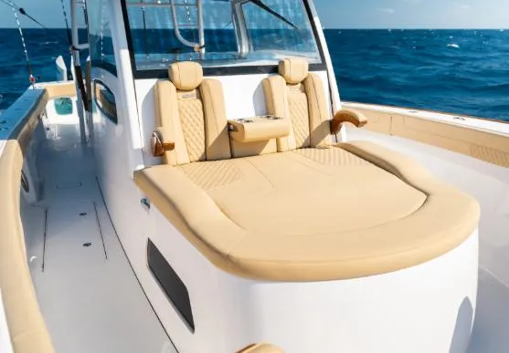 Slide: The Image of 2026 Phenom 43 Center Console boat with luxurious seating on open ocean. - 3