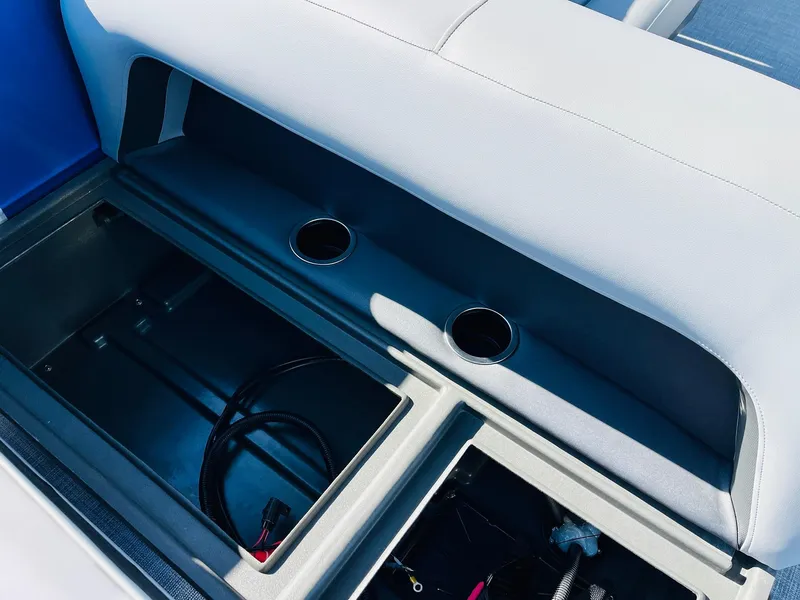 Slide: The Image of Interior storage and cup holders of 2026 Sun Tracker Party Barge 18 DLX boat. - 34