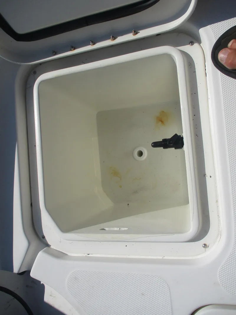 Slide: The Image of Open storage compartment on a 2008 Hydra-Sports 23 Bay Bolt boat. - 17