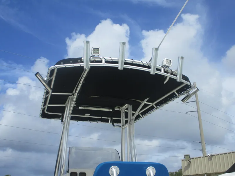 Slide: The Image of 2008 Hydra-Sports 23 Bay Bolt boat with T-top against a cloudy sky. - 23