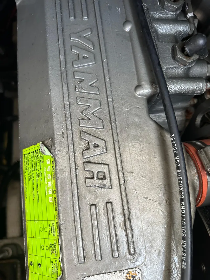 Slide: The Image of Yanmar engine in a 2005 Rampage 30 Express boat, showing detailed components and labels. - 6