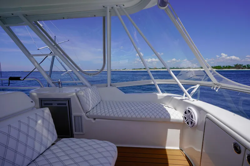 Slide: The Image of Luxurious 2007 Riviera 42 Flybridge interior with ocean view and comfortable seating. - 34