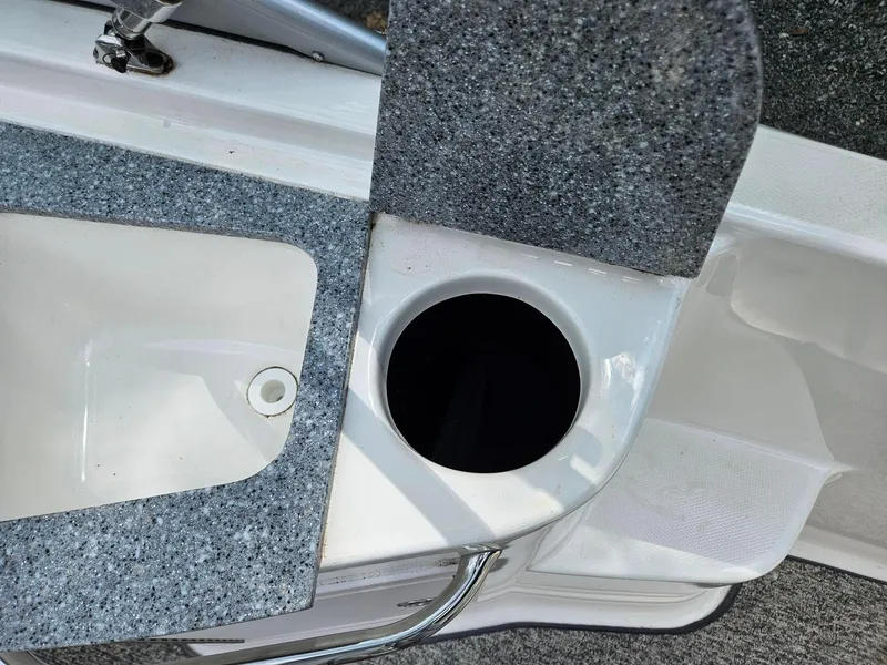 Slide: The Image of 2014 Chaparral 224 Sunesta boat sink and countertop detail. - 18